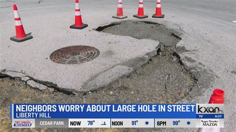 Liberty Hill neighbors worry about growing hole on their street